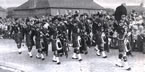 The band parading through the town sporting the new uniforms. Approx early 1970s.