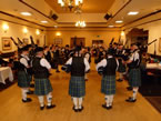 A mini band playing at the Bi-centenary Pipe Band Championships Ceilidh in 2012